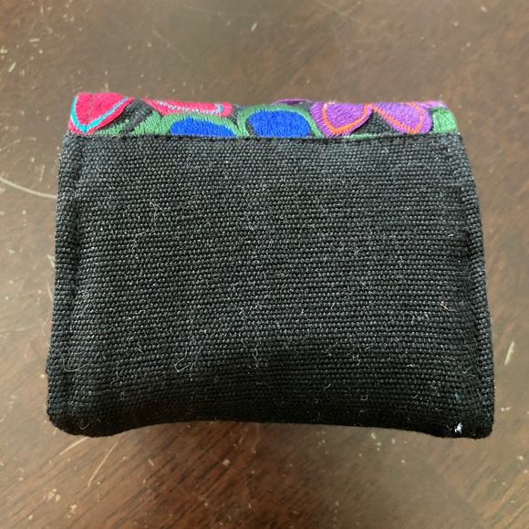 Bamboo Trading Company fold up case with 5 individual zippered compartments. - Picture 2 of 3